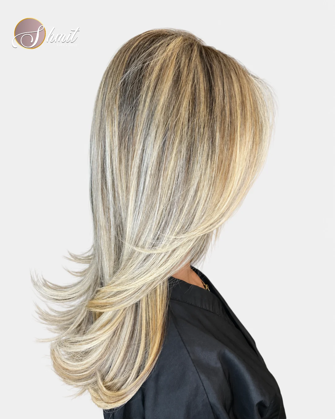 Cabello rubio con balayage y ondas realizado en peluquería Shmit Beauty Salon Madrid