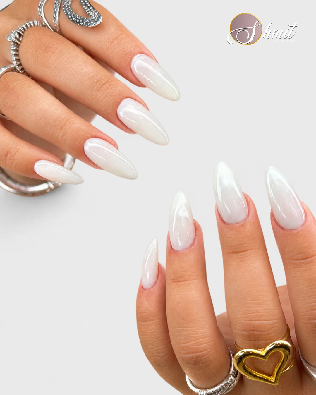 Manicura de uñas largas blancas con detalles creativos en Madrid